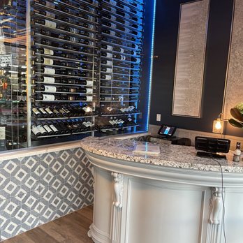 High Tide Steelyard - Hostess station and wine cellar. - Seafood Near Me - Chandler, Arizona
