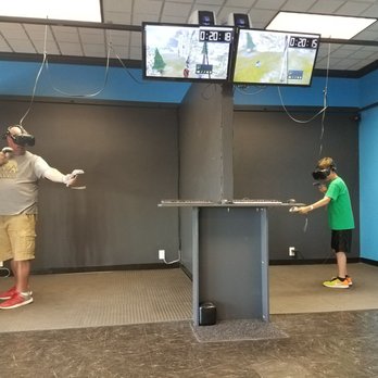 VR Universe - The boys playing QuiVr. - Arcades Near Me - Wisconsin Dells, Wisconsin VR Universe - The boys playing QuiVr. - Arcades Near Me - Wisconsin Dells, Wisconsin
