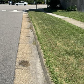Home & Land Repairs - He didn't get the curb at all.  Completely untouched.  Keep in mind, I mowed the yard.  He just needed to do the edging. - Handyman Near Me