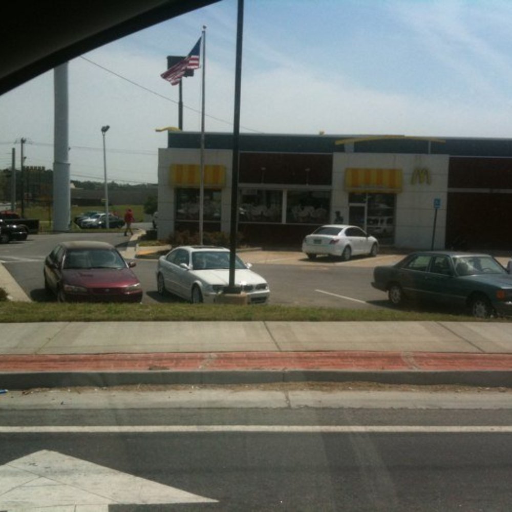 cars parked in a parking lot cars parked in a parking lot