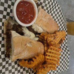 Steak and cheese with waffle fries