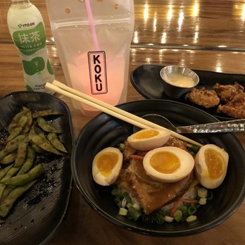 Koku Ramen & Bites - Garlic butter edamame, karaage chicken, and chashu (pork) rice bowl with extra egg. - Ramen Near Me - Beaverton, Oregon Koku Ramen & Bites - Garlic butter edamame, karaage chicken, and chashu (pork) rice bowl with extra egg. - Ramen Near Me - Beaverton, Oregon