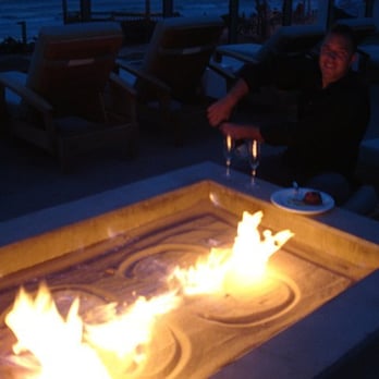 Tower 23 - Sundeck firepit -- opening some champagne and enjoying dessert from JRDN - San Diego, CA