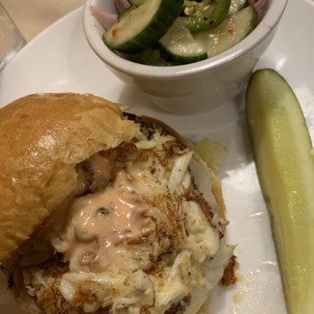 Brewer's Alley - Crab cake sandwich with cucumber jalapeño salad on the side - American Near Me - Frederick, Maryland Brewer's Alley - Crab cake sandwich with cucumber jalapeño salad on the side - American Near Me - Frederick, Maryland