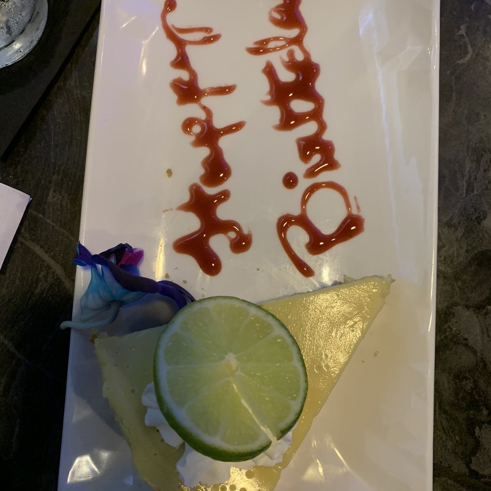 Lake Eustis Waterfront Grille - Key lime birthday pie. - Seafood Near Me - Eustis, Florida Lake Eustis Waterfront Grille - Key lime birthday pie. - Seafood Near Me - Eustis, Florida