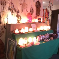 Aquarius Books and Gifts - Same room as the Moroccan lamps just passed the book room. A display table with various sizes of Himalayan salt lamps Tealight holders