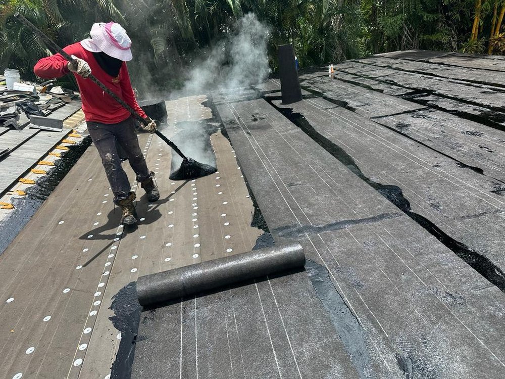 Slide of Red Apple Roofing