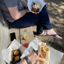 Red River Smokehouse - Chicken Fritos burrito, jalapeños and pulled pork BBQ Sammy and beans.