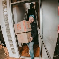 Sweet Lou Moves You - Lou carrying boxes