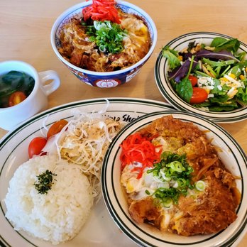 Tokyo Shokudo - Clockwise: miso soup, eel egg bowl, side salad, chicken cutlet boiled plate - Japanese Near Me - Plano, Texas Tokyo Shokudo - Clockwise: miso soup, eel egg bowl, side salad, chicken cutlet boiled plate - Japanese Near Me - Plano, Texas