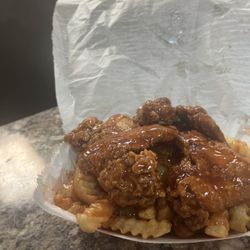 Honey's Chicken & Catering - 4 wings with signature honey sauce