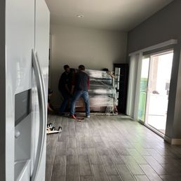 My 72 year old father having to help move the piano because the workers that were sent were not capable. My 72 year old father having to help move the piano because the workers that were sent were not capable.