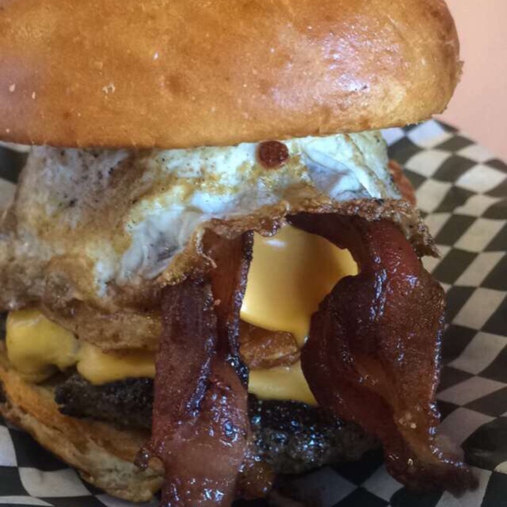 Dan's The Grub Shack - The Farmhouse Burger: hard fried egg, buffalo fries, bacon, American cheese and grape jelly - Burgers Near Me - Atascadero, California Dan's The Grub Shack - The Farmhouse Burger: hard fried egg, buffalo fries, bacon, American cheese and grape jelly - Burgers Near Me - Atascadero, California