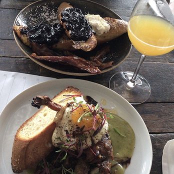 Roost - Blueberry lemon french roast in the back, duck confit in the front - American Near Me - Buffalo, New York Roost - Blueberry lemon french roast in the back, duck confit in the front - American Near Me - Buffalo, New York