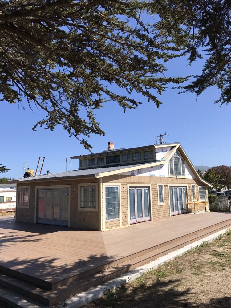 Slide of Caruzo's Roofing Contractors