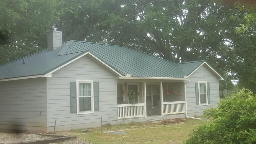 Slide of ETX Roofing