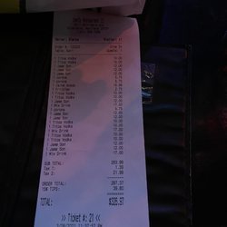 Lesly's Grill - My tab..the bartender charged us more for her shot than our singles, I work in the industry so she just charged us extra to make more money