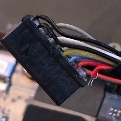 Nanosystems - A "do it yourself" fix gone wrong. The leftmost cable on this battery connector is cut.
