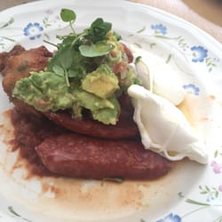 Jimmy Fox - Corn fritters with chunky guacamole, tomato salsa, chorizo, and poached eggs.