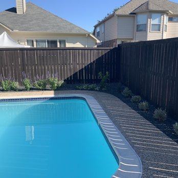 Outdoor Orchestrators - a swimming pool in a backyard - Landscaping Near Me - Bixby, Oklahoma Outdoor Orchestrators - a swimming pool in a backyard - Landscaping Near Me - Bixby, Oklahoma
