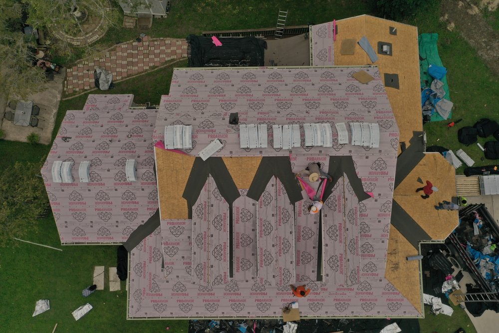 Slide of Llagua Roofing