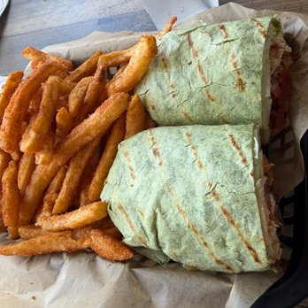 Finn’s Dockside Bar & Grill - BLT Wrap with Chicken - Sports Bars Near Me - Apollo Beach, Florida Finn’s Dockside Bar & Grill - BLT Wrap with Chicken - Sports Bars Near Me - Apollo Beach, Florida