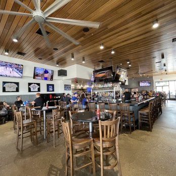 Firestone Grill - Dining are with bar in background. - Barbeque Near Me - Bakersfield, California