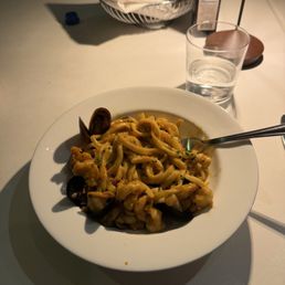 Seafood pasta. Shrimp. Clams. Muscles. Some other stuff. It was very very good. Well prepared & tasteful. Seafood pasta. Shrimp. Clams. Muscles. Some other stuff. It was very very good. Well prepared & tasteful.