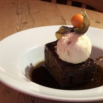 The Bull Inn - Sticky toffee pudding with caramel sauce and toffee ice cream at the Bull Inn - British Near Me - Mildenhall, SFK The Bull Inn - Sticky toffee pudding with caramel sauce and toffee ice cream at the Bull Inn - British Near Me - Mildenhall, SFK