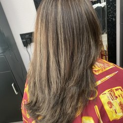 A Cut Above Salon - Cut,color and highlights by Diana . She did an amazing job and I've gotten so much compliments. Love it!
