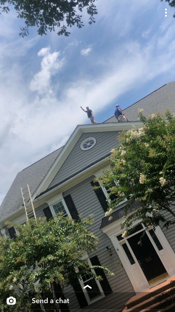 Slide of The Roofing Company