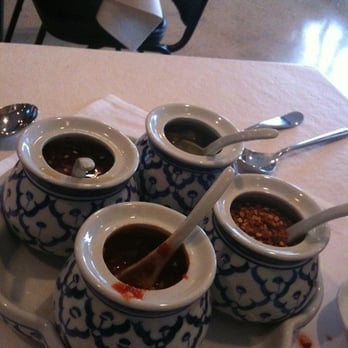 Hot Basil - Condiments: Chilis , fish sauce, garlic chili paste - Thai Near Me - Overland Park, Kansas Hot Basil - Condiments: Chilis , fish sauce, garlic chili paste - Thai Near Me - Overland Park, Kansas