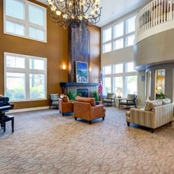 The Seasons of Reno - The Seasons of Reno | Assisted Living & Memory Care | Reno, NV | Piano & seating around fireplace