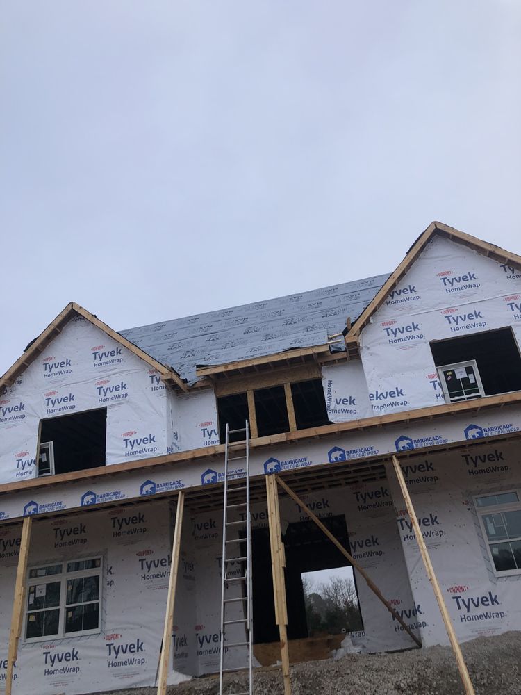 Slide of E & S Roofing