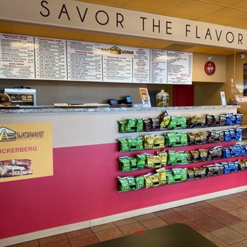 Subs A Licious - a woman standing in front of a counter - Sandwiches Near Me - San Jose, California Subs A Licious - a woman standing in front of a counter - Sandwiches Near Me - San Jose, California