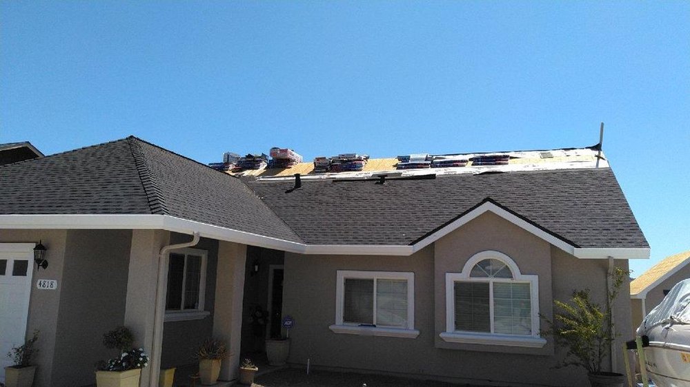 Slide of Warren Roofing