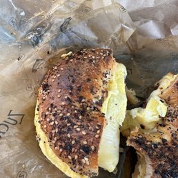 BEC with hot sauce on an everything bagel. BEC with hot sauce on an everything bagel.
