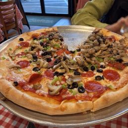 Deluxe pizza with extra meat on one half. Outstanding.
