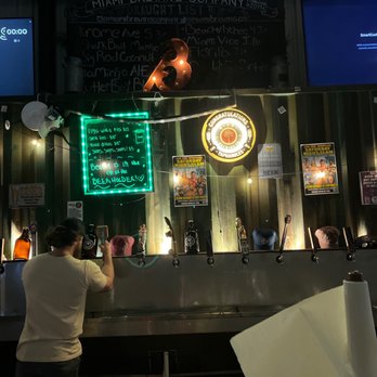 Miami Brewing Company - a man at the bar - Breweries Near Me - Homestead, Florida Miami Brewing Company - a man at the bar - Breweries Near Me - Homestead, Florida