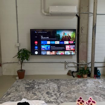 TV On The Wall - 75" mounted on brick with tilting mount - TV Mounting Near Me - San Antonio, Texas