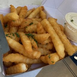 Super crispy crinkled cut French fries Super crispy crinkled cut French fries