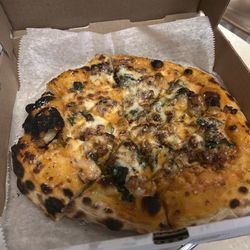 Appleseeds Restaurant - Sausage, spinach, cheese and vodka sauce pizza. Absolutely delicious. Note the charred bubbles.