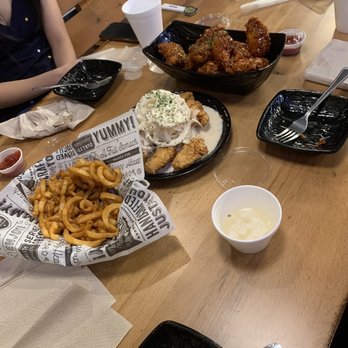 CM Chicken Carrollton - Snow onion chicken and Garlic Spicy Chicken with curly fries - Chicken Shop Near Me - Carrollton, Texas