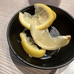 Squeezed lemons that were brought to me.