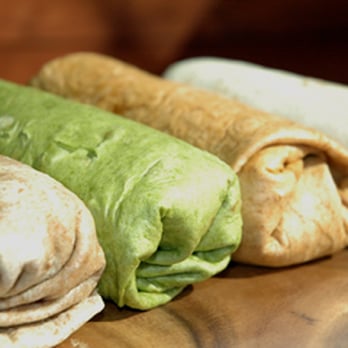 Barberitos - three burritos on a cutting board - Caterers Near Me - Thomasville, Georgia Barberitos - three burritos on a cutting board - Caterers Near Me - Thomasville, Georgia