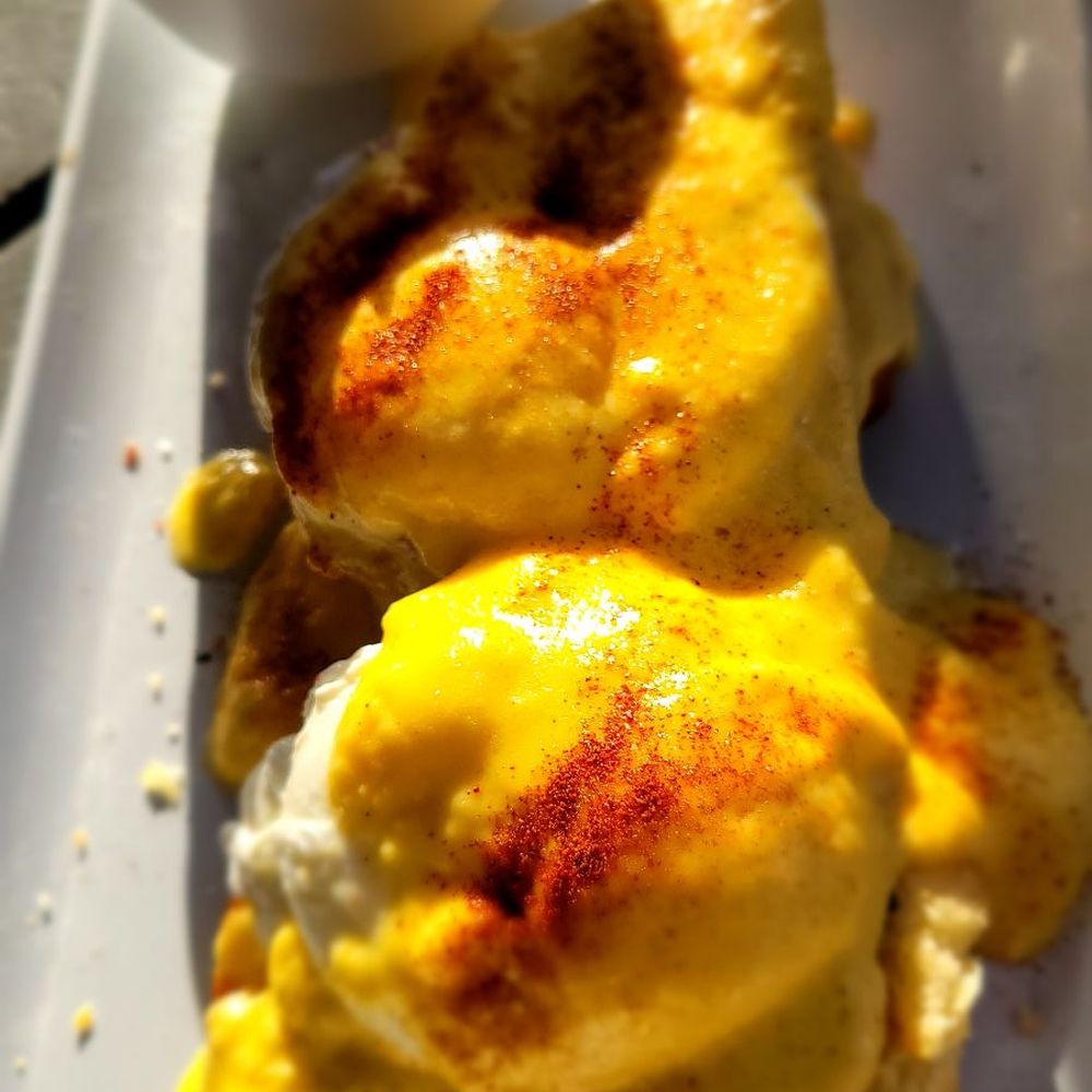 Eggs Benedict, grits Eggs Benedict, grits
