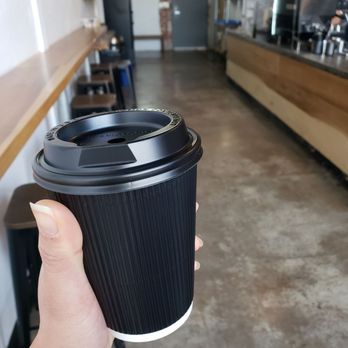 Black Ring Coffee Roasters - Iced honey oat latte to go! Cool lid - Coffee Roasteries Near Me - Long Beach, California