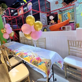 My Lil Town Eagle Rock - kids table with tablecloth & balloons & gold chivari chairs - Indoor Playcenter Near Me - Los Angeles, California My Lil Town Eagle Rock - kids table with tablecloth & balloons & gold chivari chairs - Indoor Playcenter Near Me - Los Angeles, California