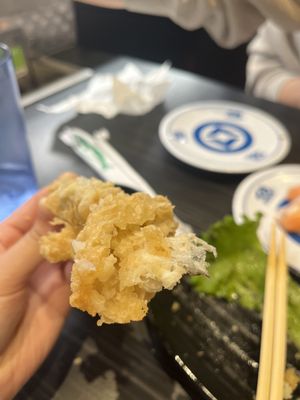 Kura Revolving Sushi Bar by null