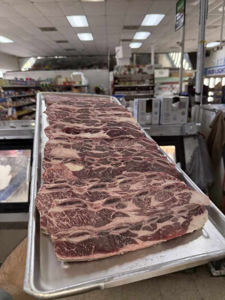 F & T Mini Market Logo